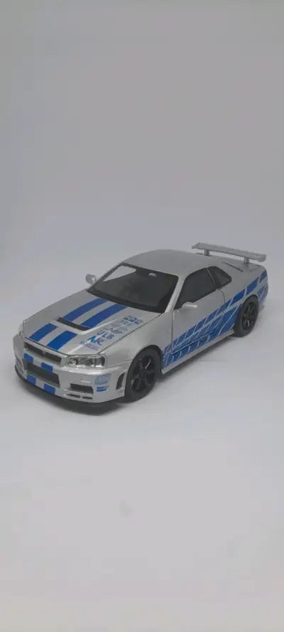 Nissan Skyline Gtr R34 Auto a Escala 1:32 - miniatura 1