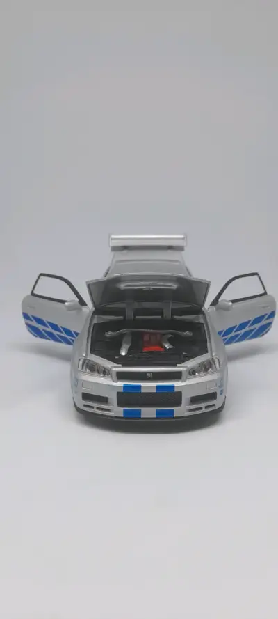 Nissan Skyline Gtr R34 Auto a Escala 1:32 - miniatura 3