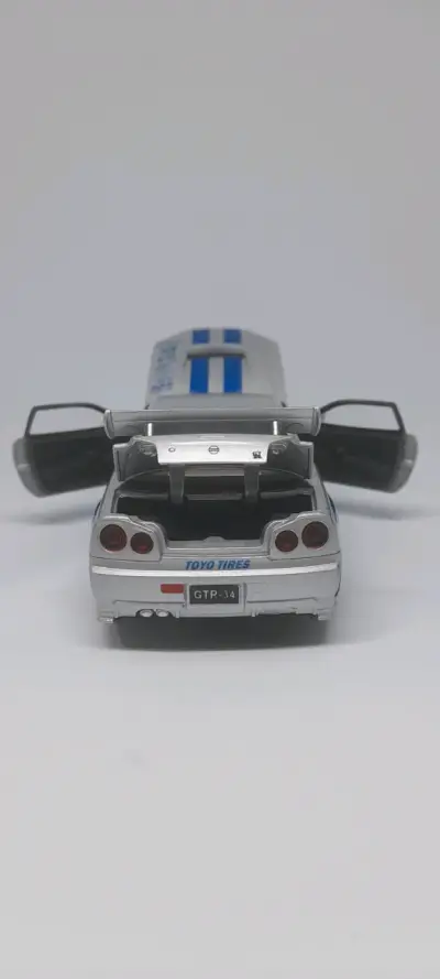 Nissan Skyline Gtr R34 Auto a Escala 1:32 - miniatura 4