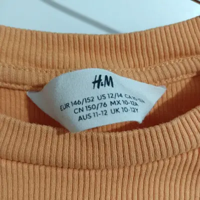 Polera H&M naranja talla 12/14 - miniatura 1