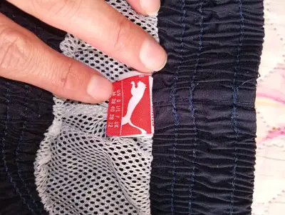 Pantalón deportivo Puma negro y rosado talla 38 - miniatura 4