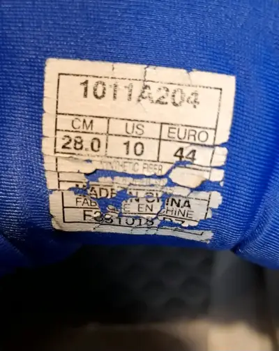 Zapatillas deportivas Asics grises y azules - miniatura 2