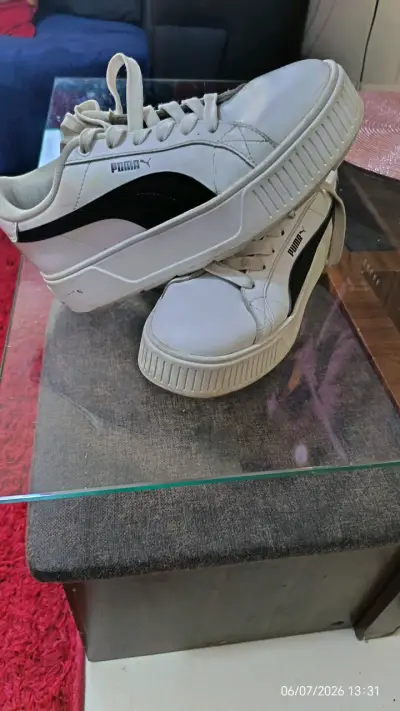 Zapatillas deportivas Puma blancas y negras - miniatura 1