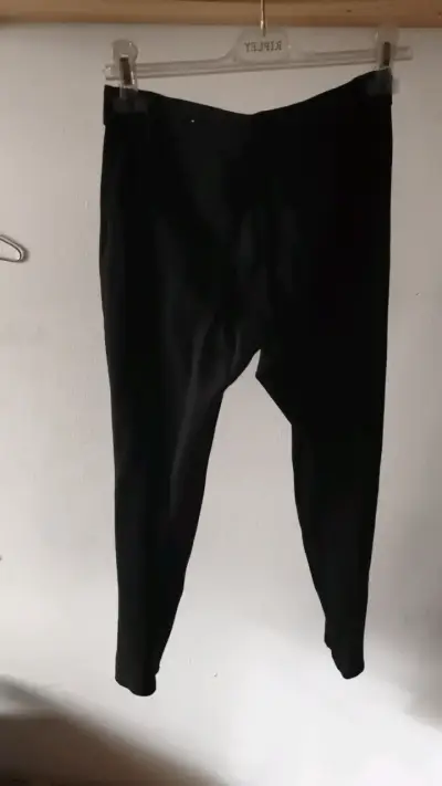 Pantalones negros con cierre de mujer - miniatura 2