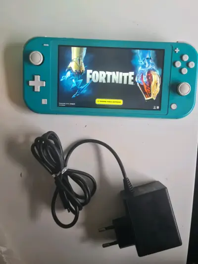 Nintendo Switch Lite turquesa con cargador - miniatura 1