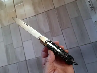 Cuchillo plegable con funda de cuero - miniatura 2