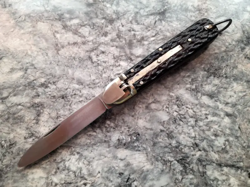 Cuchillo plegable con funda de cuero - 3