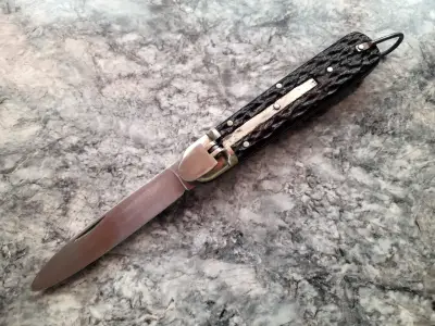 Cuchillo plegable con funda de cuero - miniatura 3