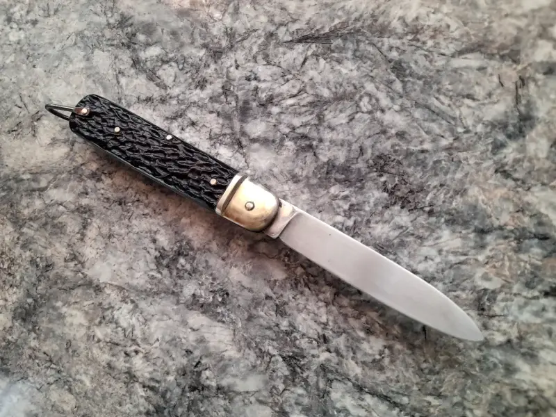 Cuchillo plegable con funda de cuero - 5