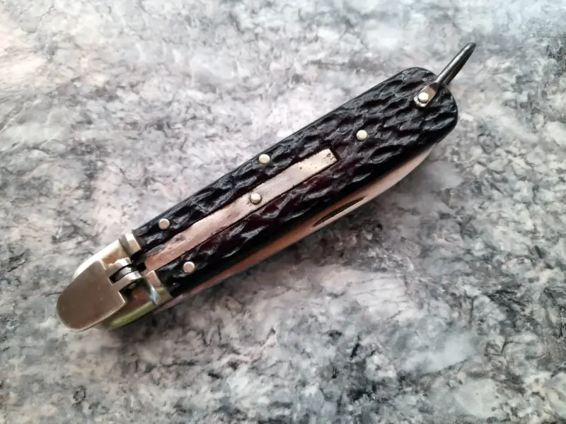 Cuchillo plegable con funda de cuero - 6