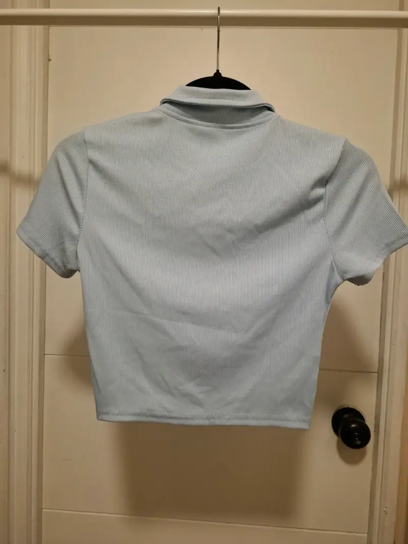 Blusa celeste con cierre - 2