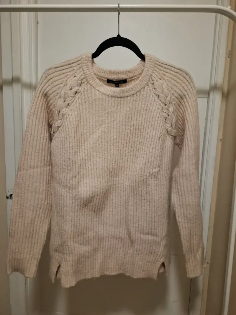 Sweater palo rosa de lana con diseño trenzado - 1