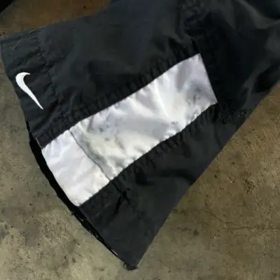Pantalones deportivos Nike negros con franjas - miniatura 5
