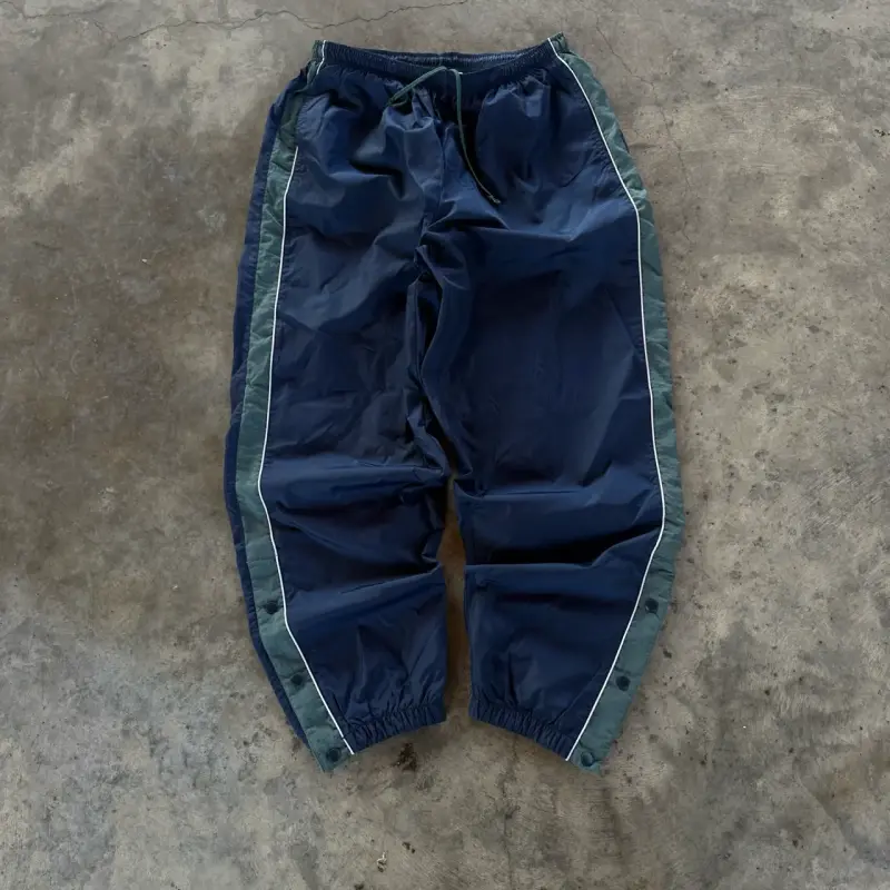 Pantalones deportivos azul con franjas laterales - 1