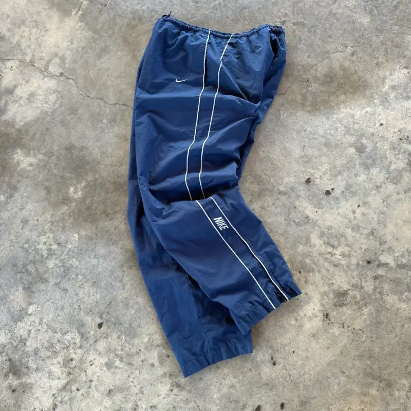 Pantalones deportivos Nike azul con logo - 1