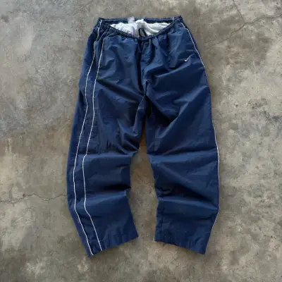 Pantalones deportivos Nike azul con logo - miniatura 4