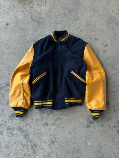 Chaqueta varsity negro y amarillo cuero vintage - miniatura 1