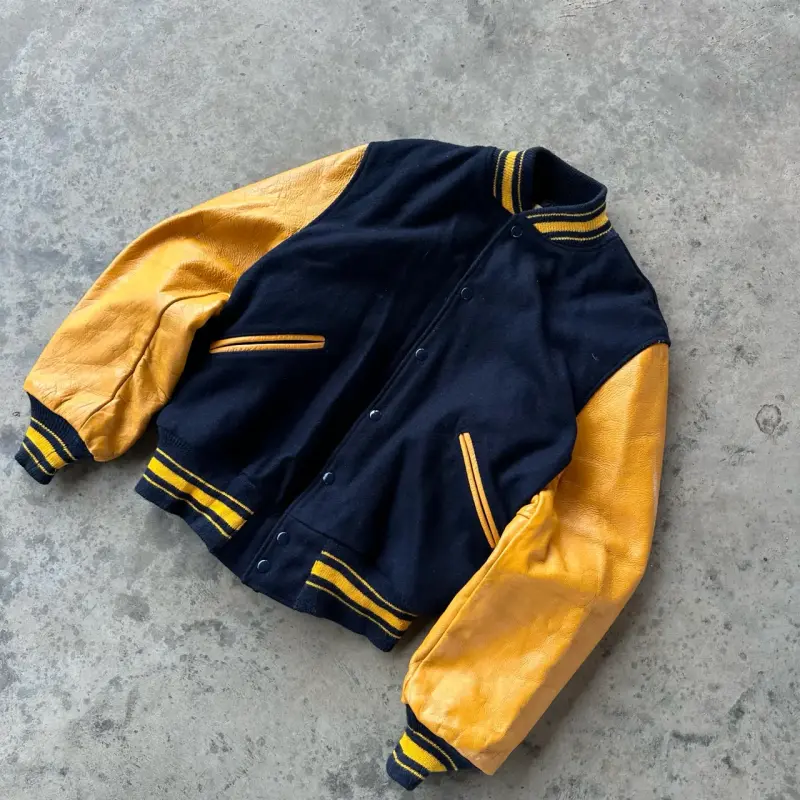 Chaqueta varsity negro y amarillo cuero vintage - 2