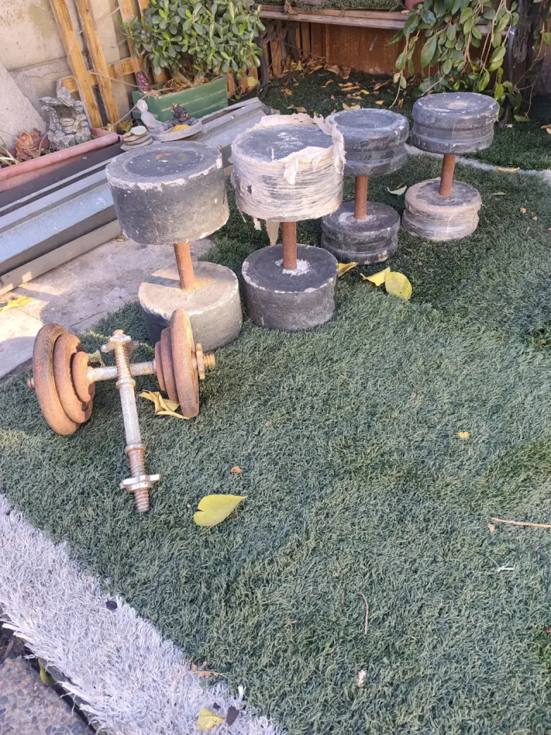 Banco de pesas con barra y discos - 3