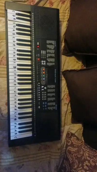 Teclado electrónico portátil con 61 teclas - miniatura 1