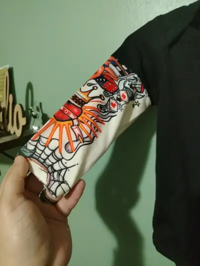 Body de bebé negro con mangas estampadas - miniatura 3