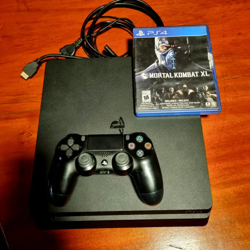 Consola PS4 con control y juego Mortal Kombat XL - 1