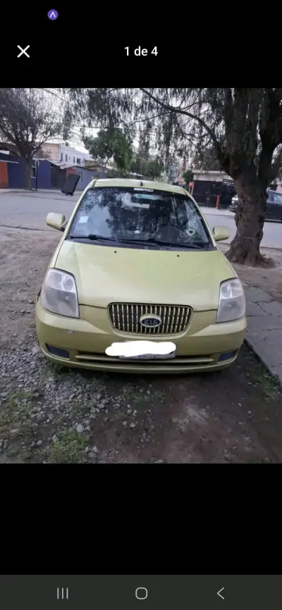 Auto Kia verde en buen estado - miniatura 1