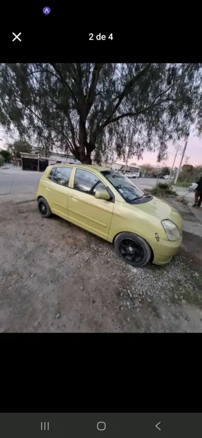 Auto Kia verde en buen estado - miniatura 2