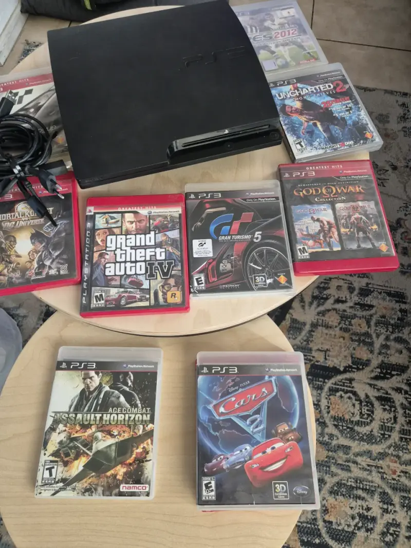 Consola PS3 con juegos variados - 1