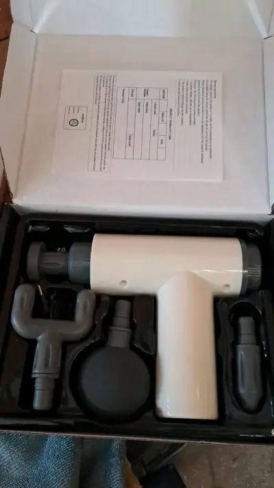Pistola de masaje con 4 cabezales - miniatura 3