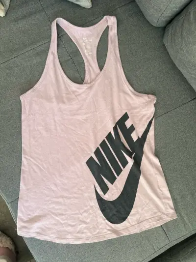Polera deportiva Nike sin mangas rosada - miniatura 1