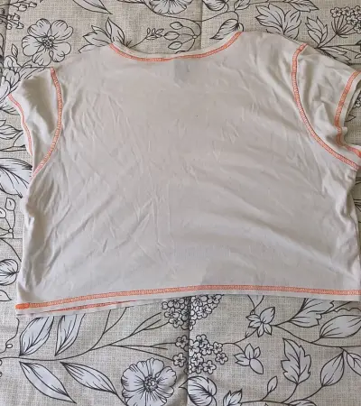 Polera beige con diseño de sol naranja H&M - miniatura 2