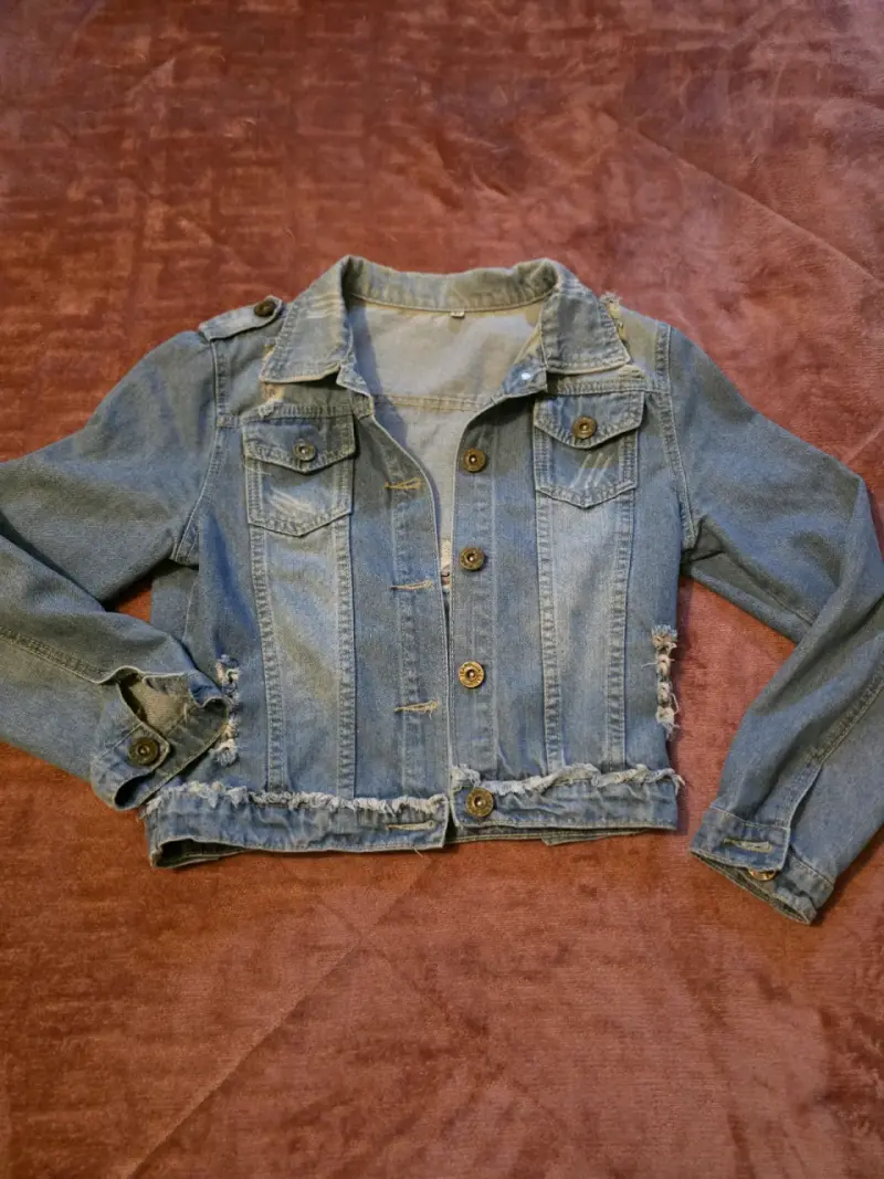 Chaqueta de mezclilla azul desgastada - 1