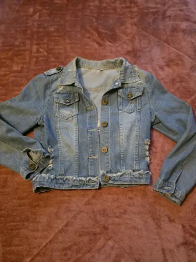 Chaqueta de mezclilla azul desgastada - miniatura 1