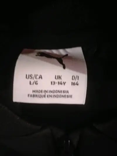Chaqueta deportiva Puma negra y blanca - miniatura 2