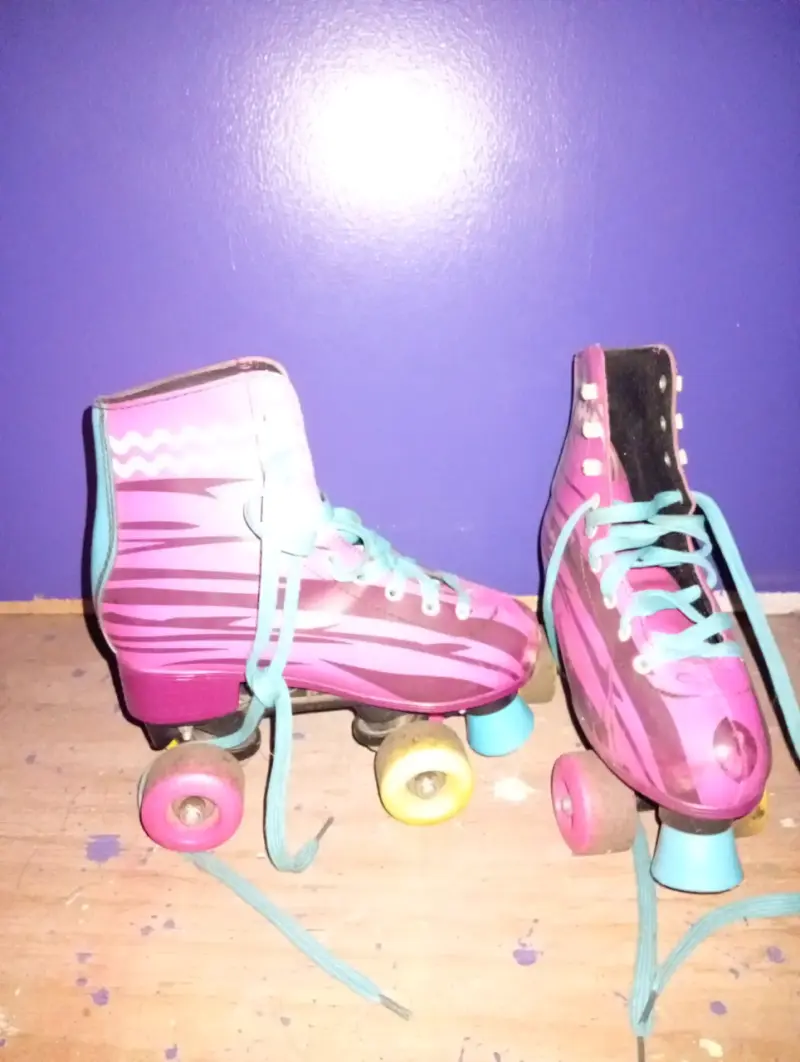 Patines de cuatro ruedas retro rosados