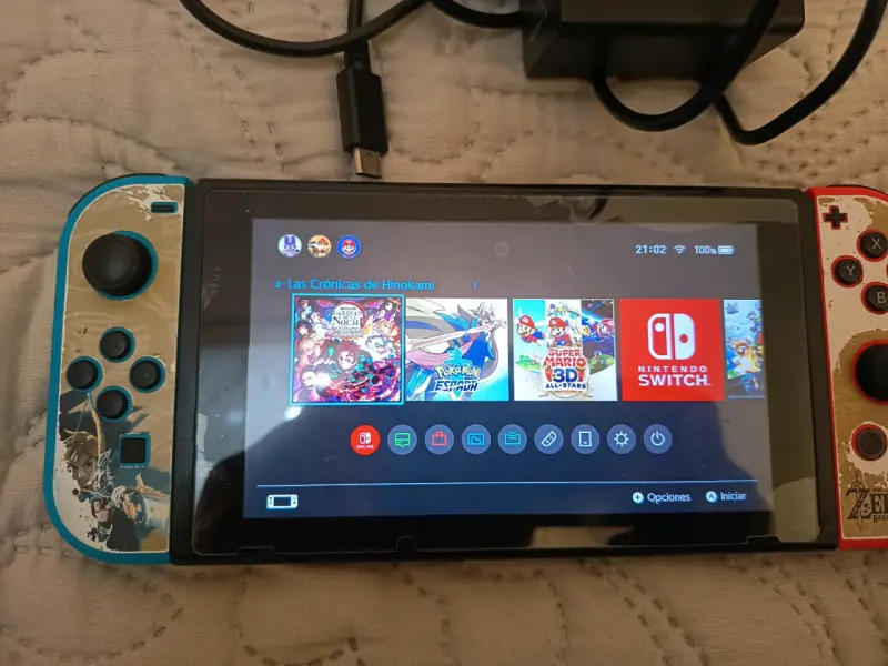 Nintendo Switch con accesorios y cargador - 2