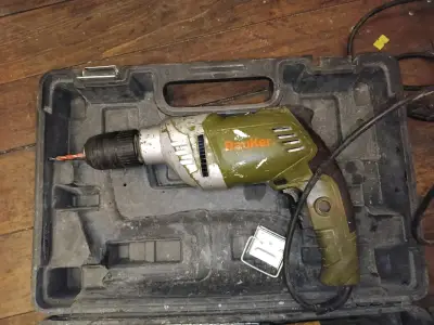 Taladro eléctrico BauKer con estuche - miniatura 1
