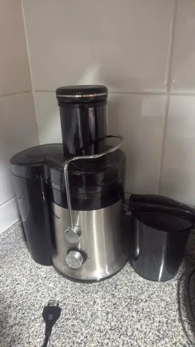 Extractor de Jugo Oster 320s Acero Inoxidable - miniatura 2