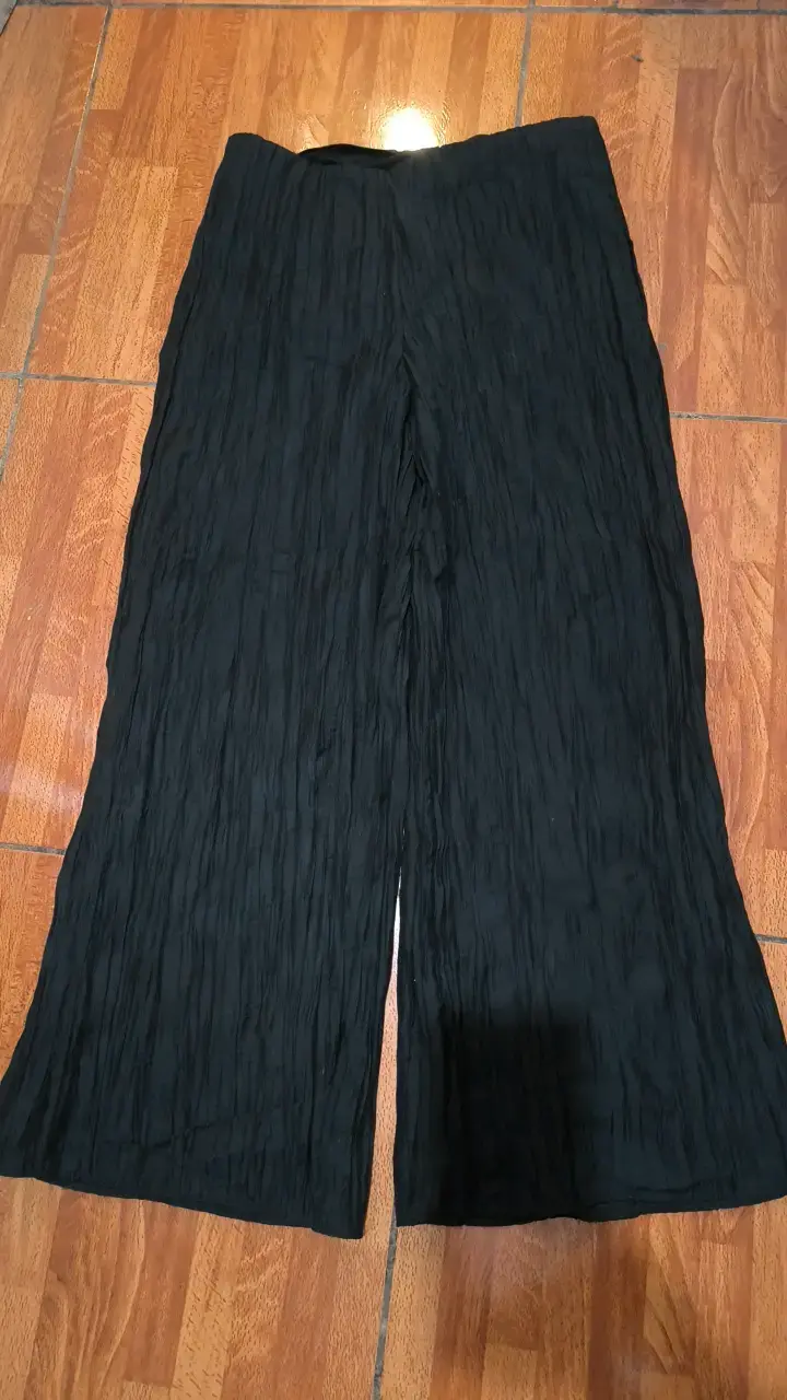 Pantalones acampanados negros con botones - 3