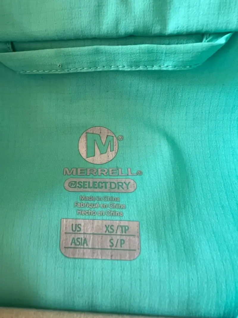 Chaqueta impermeable turquesa para mujer - 3