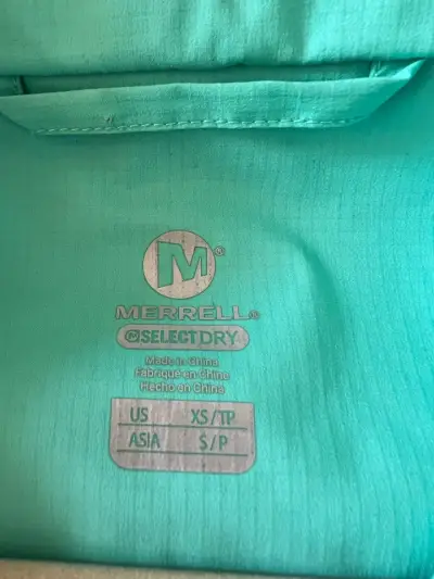 Chaqueta impermeable turquesa para mujer - miniatura 3