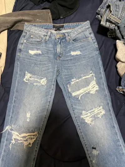 Jeans desgastados de mezclilla azul - miniatura 1