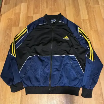 Chaqueta deportiva Adidas azul y negra - miniatura 1