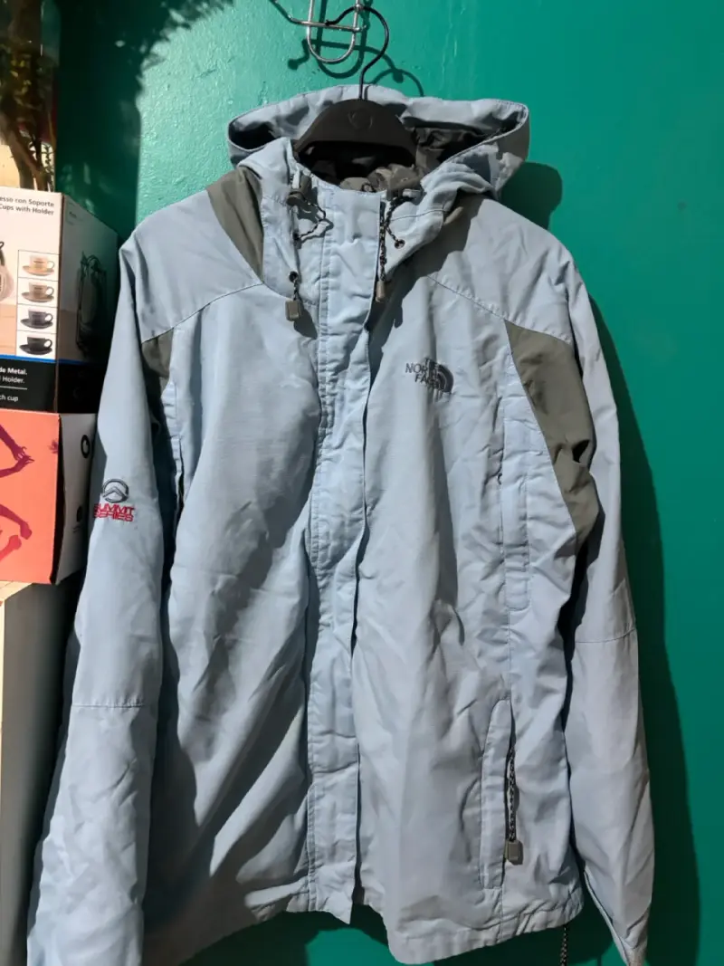 Chaqueta impermeable The North Face celeste - 1