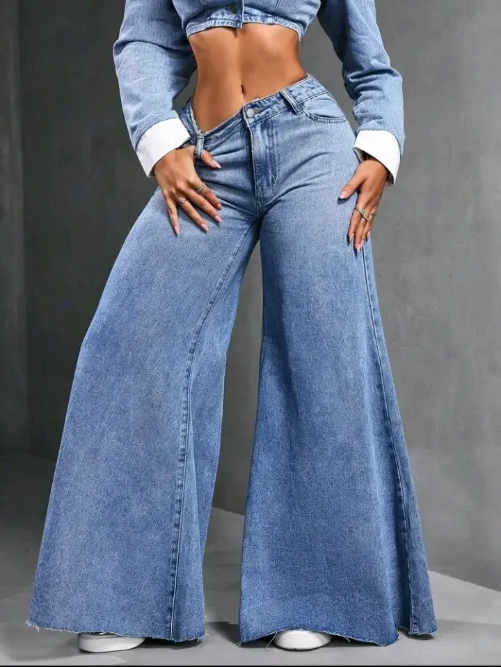 Jeans acampanados de mezclilla azul - 1