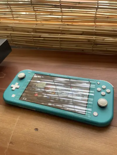 NINTENDO SWITCH LITE MAGICA  🪄 - miniatura 1