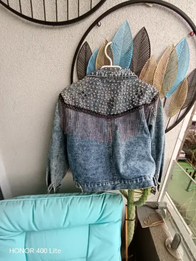 Chaqueta de mezclilla con tachas y flecos - miniatura 1