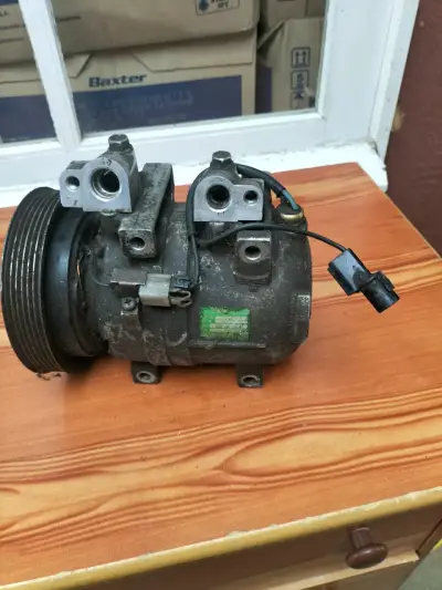 Compresor de aire acondicionado para auto usado - miniatura 1