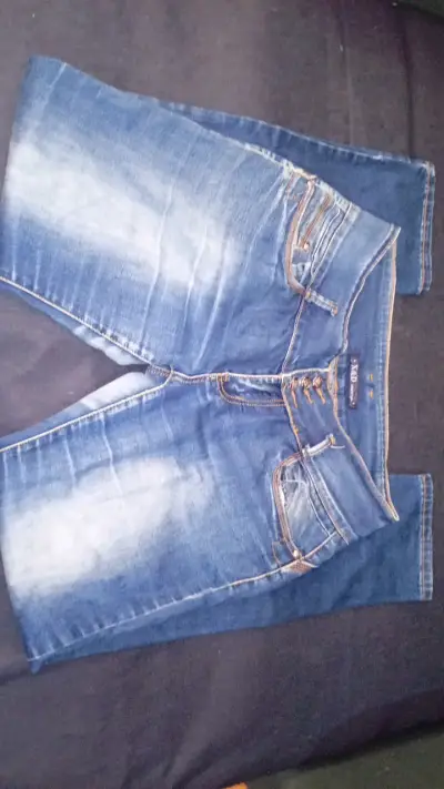 Jeans azul desgastado para mujer - miniatura 1